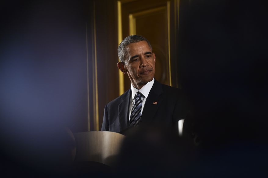 US President Barack Obama and Britain's Prime Minister David Cameron, not pictured, hold a media conference at the Foreign and Commonwealth Office in central London, Friday, April, 22, 2016, following their talks at Downing Street. Obama stepped into Britain's debate about EU membership and many other topics during his short visit to the UK. (Ben Stansall / Pool via AP)
