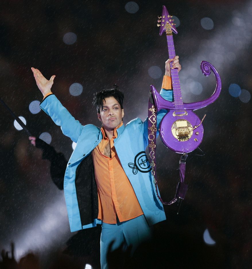 Prince performs during the halftime show at the Super Bowl XLI football game at Dolphin Stadium in Miami on Sunday, Feb. 4, 2007. (AP Photo/Chris O'Meara)