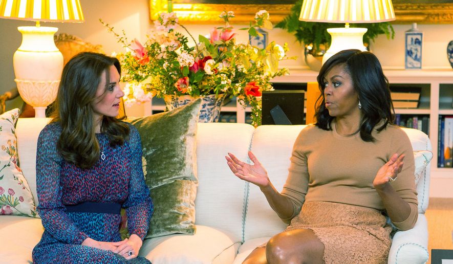 Britian's Kate Duchess of Cambridge talks with US first lady Michelle Obama in the Drawing Room of Kensington Palace, London, prior to a private dinner hosted by Prince William and Kate, Friday April 22, 2016. President Barack Obama and Michelle plunged into a whirlwind visit to England with royal socializing and political talks. (Dominic Lipinski/Pool via AP)