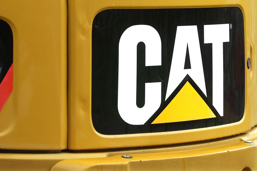 FILE - This June 10, 2014, file photo, shows the Caterpillar logo on heavy, earth-moving equipment in Springfield, Ill. Caterpillar Inc. reports financial results Friday, April 22, 2016. (AP Photo/Seth Perlman, File)