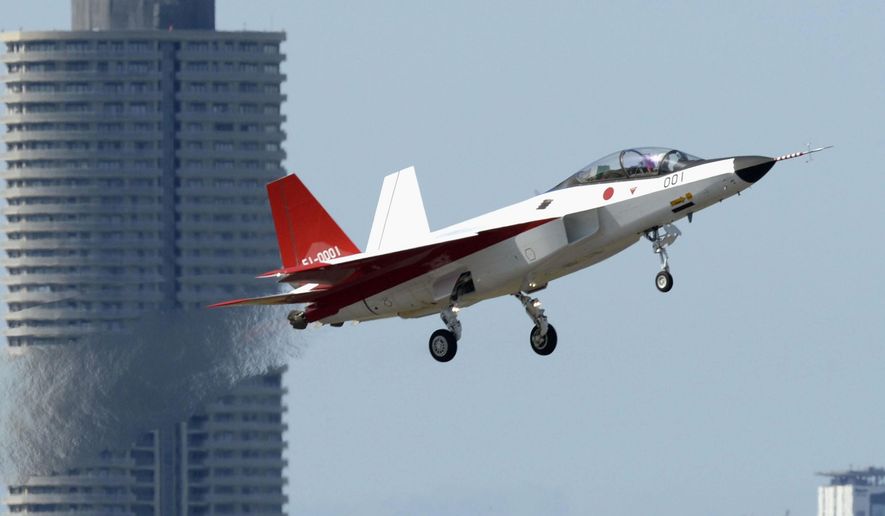 The prototype of Japan's first stealth aircraft type X-2 takes off an airport in Toyoyama, Aichi prefecture, central Japan Friday, April 22, 2016. Japan's first domestically-manufactured stealth plane successfully made its first flight on Friday, putting the nation at the forefront of only a handful of nations with stealth capabilities. (Kyodo News via AP) JAPAN OUT, MANDATORY