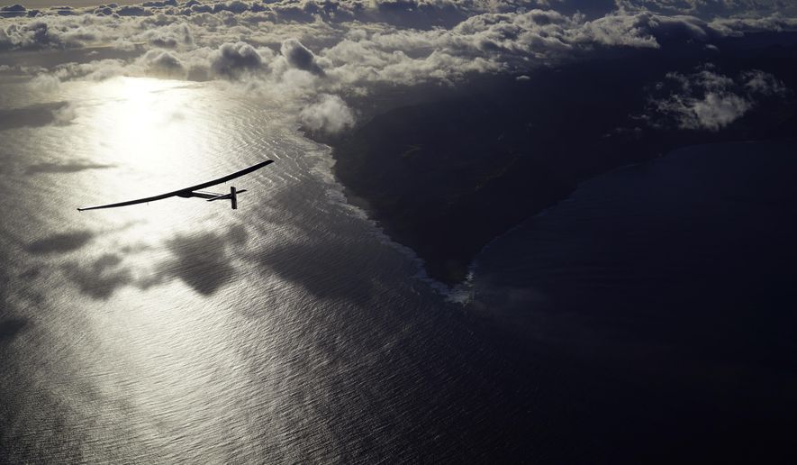 In this photo provided by Solar Impulse, the solar powered plane, "Solar Impulse 2," piloted by Bertrant Piccard of Switzerland, is seen in the air Thursday, April 21, 2016, after successfully taking off from Kalaeloa Airport, O'ahu, Hawaii, for a non-stop three day flight expected to cover about 3,760 kilometers (2,336 miles) to San Francisco. (Jean Revillard/Solar Impulse via AP)