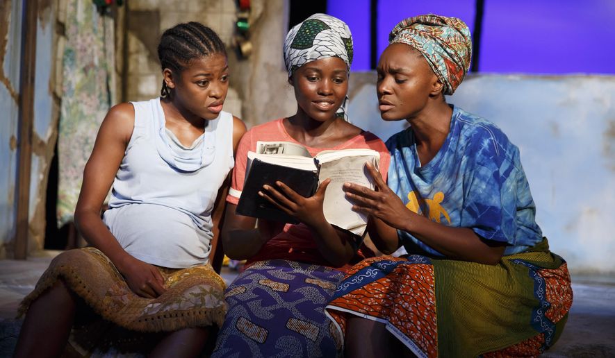 This photo provided by The Public Theater shows, Pascale Armand, from left, Lupita Nyong’o, and Saycon Sengbloh in "Eclipsed," written by Danai Gurira, in New York. In an effort to shine a light on the hundreds of girls abducted from a school in Nigeria two years ago, all performances of the Broadway play “Eclipsed” will be dedicated to the still-missing victims. Gurira said Friday, April 22, 2016, that each future performance of her play will be dedicated to a girl who has been abducted by the Boko Haram and will be named in her honor. (Joan Marcus/The Public Theater via AP)