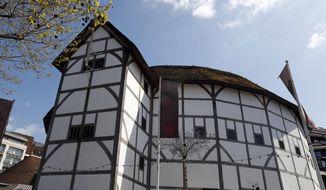 FOR JILL LAWLESS STORY BRITAIN SHAKESPEARE 400 -  A view of The Globe Theatre, nestled alongside contemporary buildings on the banks of the River Thames in London, in this photo dated Tuesday, April 19, 2016.  The 400th anniversary of the playwright&#39;s death on April 23, is being marked across Britain with parades, church services and of course, stage performances, as Shakespeare wrote the play&#39;s the thing, and today all the world may be contained on stage at the Globe Theatre. (AP Photo/Kirsty Wigglesworth)