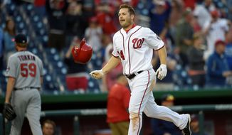 The Washington Nationals&#39; Chris Heisey hit his first career walkoff home run in the 16th inning in a 6-5 victor y over the Minnesota Twins on Sunday. (Associated Press)