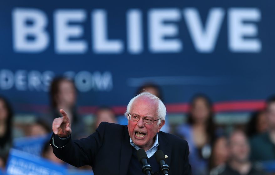 Democratic presidential candidate Sen. Bernie Sanders, I-Vt., addresses supporters during a campaign rally on New Haven Green in New Haven, Conn., Sunday, April 24, 2016. (AP Photo/Charles Krupa)