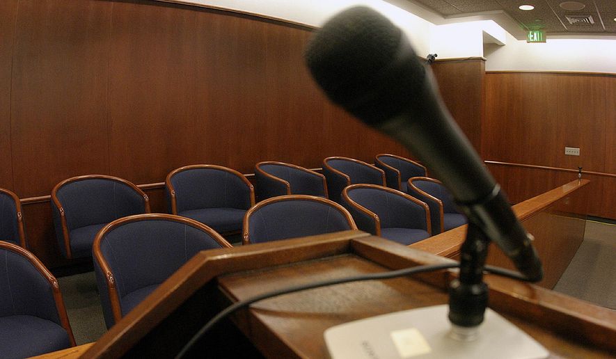 The jury box from a California courtroom is shown in this In this Jan. 30, 2005, file photo. (Spencer Weiner/Los Angeles Times via AP, Pool, File) **FILE**