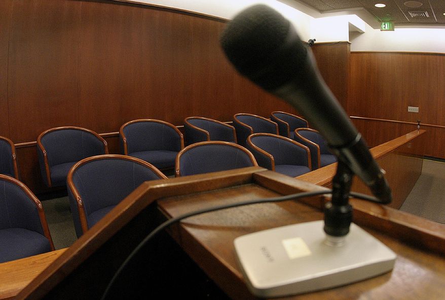The jury box from a California courtroom is shown in this In this Jan. 30, 2005, file photo. (Spencer Weiner/Los Angeles Times via AP, Pool, File) **FILE**