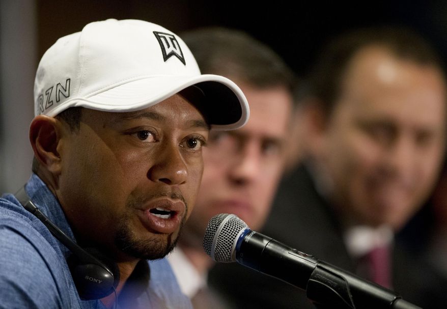 FILE - In this Oct. 20, 2015 file photo, Tiger Woods responds to a question during a press conference in Mexico City. Tiger Woods registered for the U.S. Open, which was more procedure than pronouncement. Three weeks later, he played five holes during the official opening of the golf course he designed outside Houston. The next step is returning to competition, which remains unknown. (AP Photo/Rebecca Blackwell, File)