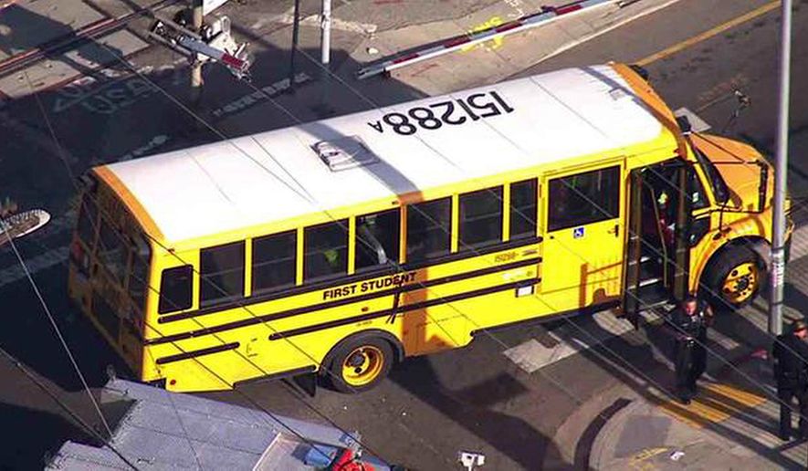 This image made from video provided by KABC-TV, shows a broken window of a school bus where a railroad crossing arm broke through the passenger window of the bus in South Los Angeles on Tuesday, April 26, 2016. Los Angeles authorities say nobody was hurt when a railroad track crossing arm crashed through a passenger window of a school bus and came out a window on the other side. (KABC-TV via AP) MANDATORY CREDIT; TV OUT