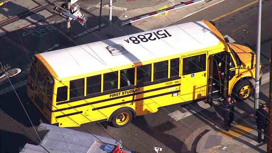 This image made from video provided by KABC-TV, shows a broken window of a school bus where a railroad crossing arm broke through the passenger window of the bus in South Los Angeles on Tuesday, April 26, 2016. Los Angeles authorities say nobody was hurt when a railroad track crossing arm crashed through a passenger window of a school bus and came out a window on the other side. (KABC-TV via AP) MANDATORY CREDIT; TV OUT