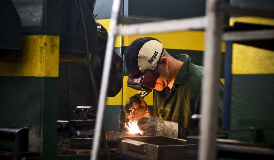 In this photo taken Monday, April 25, 2016, inmates practice learning the trade of welding through the Vocational Village program at the Richard A. Handlon Correctional Facility in Ionia, Mich. The vocational program enrolls eligible prisoners in career-worthy technical education such as welding, carpentry and automotive technology. Inmates are housed together to foster a supportive, learning environment. (Emily Rose Bennett/The Grand Rapids Press via AP) ALL LOCAL TELEVISION OUT; LOCAL TELEVISION INTERNET OUT; MANDATORY CREDIT