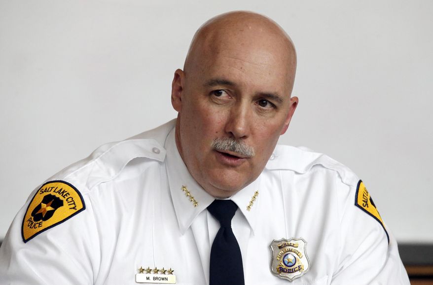 FILE - This Feb. 29, 2016, file photo, Salt Lake City interim Police Chief Mike Brown speaks with reporters during a news conference, in Salt Lake City. The mayor of Salt Lake City is appointing a new police chief: Mike Brown, who has overseen the response to rising protests over police shootings while serving as the interim leader since his boss's forced resignation. (AP Photo/Rick Bowmer, File)