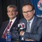 Washington Wizards new head coach Scott Brooks speaks during a news conference at the Verizon Center in Washington, Wednesday, April 27, 2016. Brooks reached a five-year agreement with the team last week. looking on is Wizards majority owner Ted Leonsis. (AP Photo/Pablo Martinez Monsivais)