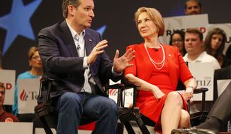 In this photo taken March 11, 2016, Republican presidential candidate, Sen. Ted Cruz, R-Texas speaks to Carly Fiorina in Orlando, Fla., Friday, March 11, 2016. According to an AP Source: Cruz has picked Fiorina as his running mate  (AP Photo/Mike Carlson)