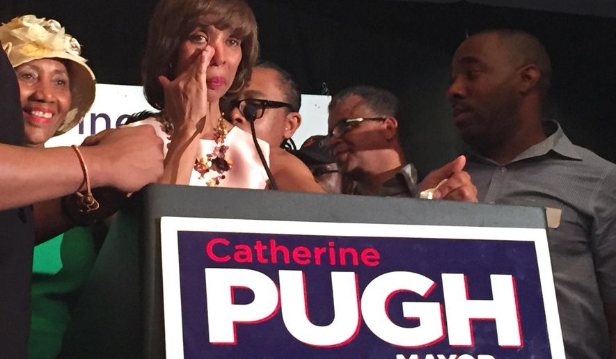 Catherine Pugh, a three-term state senator who owns a public relations firm, celebrates Tuesday, April 26, 2016, in Baltimore after winning the democratic nomination in Baltimore’s mayoral race. (AP Photo/Juliet Linderman)