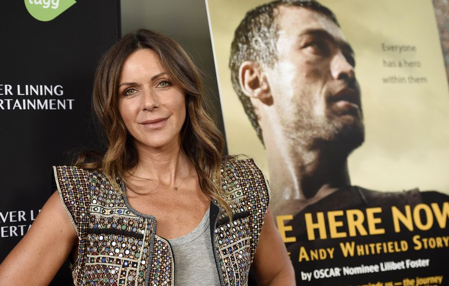 FILE - In this April 5, 2016 file photo, Vashti Whitfield, widow of actor Andy Whitfield, poses at the premiere of the film "Be Here Now (The Andy Whitfield Story)," in Beverly Hills, Calif. Andy Whitfield died of non-Hodgkin lymphoma in 2011. (Photo by Chris Pizzello/Invision/AP, File)