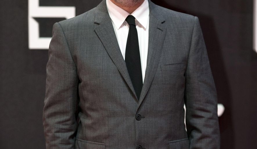 FILE -- In this Nov. 2, 2015 file photo, director Sam Mendes poses for photographers as he walks the red carpet at the regional premiere of the latest James Bond film, "Spectre," at the National Auditorium in Mexico City. The Venice Biennale says Oscar-winning British director Mendes will head the jury that will choose winners at the world’s oldest film festival this year. (AP Photo/Rebecca Blackwell)