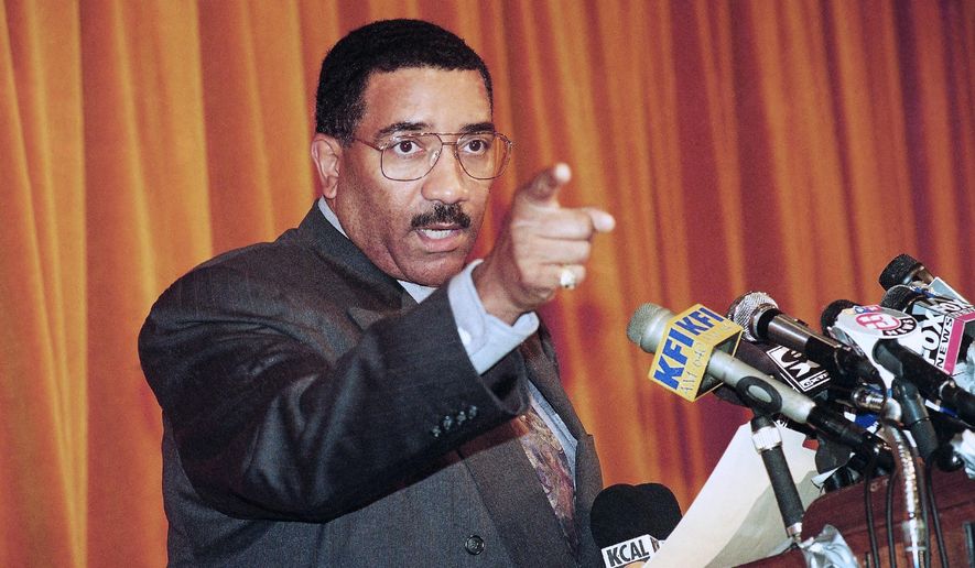 FILE - In this Jan. 17, 1997, file photo, Los Angeles Police Chief Willie L. Williams discusses the fatal shooting of comedian Bill Cosby's son Ennis Cosby during a news conference in Los Angeles. Williams, the first black police chief in Philadelphia and in Los Angeles, died Tuesday, April 26, 2016, at the age of 72 and had been diagnosed with pancreatic cancer, according to his daughter-in-law Valerie Williams. (AP Photo/Nick Ut, File)