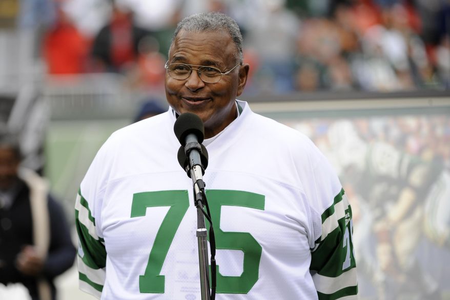 FILE - In this Nov. 1, 2009, file photo, Former New York Jets offensive lineman Winston Hill is honored during halftime of an NFL football game in East Rutherford, N.J. Hill, a durable Pro Bowl offensive tackle who helped protect Joe Namath on the way to the New York Jets' Super Bowl victory in 1969, has died. He was 74. The team announced Tuesday, April 26, 2016, that Hill died in his adopted hometown of Denver. (AP Photo/Bill Kostroun, File)