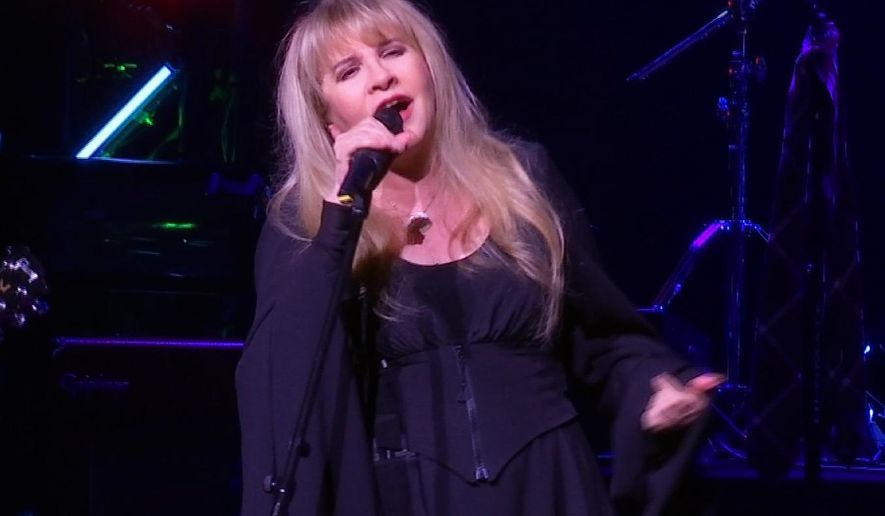 This image made from video shows singer Stevie Nicks singing "Rhiannon" during a surprise performance after the curtain call for the musical "School of Rock," Tuesday, April 26, 2016, in New York. (AP Photo/Bruce Barton)