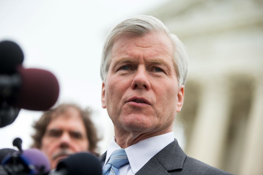 Former Virginia Gov. Bob McDonnell speaks outside the Supreme Court in Washington, Wednesday, April 27, 2016, after the Supreme Court heard oral arguments on the corruption case of McDonnell. The Supreme Court seems likely to overturn the conviction of McDonnell on political corruption charges and place new limits on the reach of federal bribery laws. (AP Photo/Andrew Harnik)