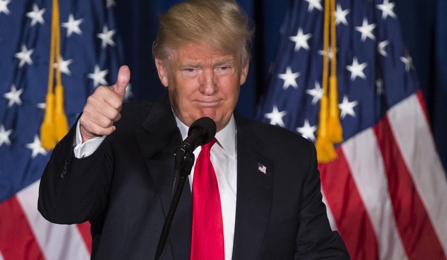FILE - In this Wednesday, April 27, 2016 file photo, Republican presidential candidate Donald Trump gives a thumbs up after giving a foreign policy speech at the Mayflower Hotel in Washington. Trump is courting Golden State voters who could put him over the top in GOP convention delegates. The presidential candidate will kick off his California campaign with a rally in Costa Mesa Thursday night before he addresses the state's Republican convention on Friday, his campaign announced. (AP Photo/Evan Vucci, File)