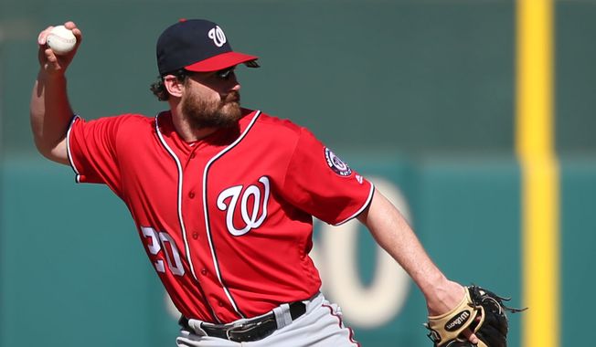 Washington Nationals second baseman Daniel Murphy (20) in action during a baseball game against the Philadelphia Phillies, Sunday, April 17, 2016, in Philadelphia. (AP Photo/Laurence Kesterson)