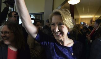 Carly Fiorina reacts to supporters inside a restaurant in Elkhart, Ind., as she campaigns with Republican presidential candidate Sen. Ted Cruz, R-Texas, Thursday April 28, 2016, as Cruz and his vice presidential choice Fiorina greeted supporters. (AP Photo/Joe Raymond)