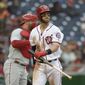 Washington Nationals&#39; Bryce Harper reacts after he struck out during the fourth inning of a baseball game against the Philadelphia Phillies, Thursday, April 28, 2016, in Washington. The Phillies won 3-0.(AP Photo/Nick Wass)