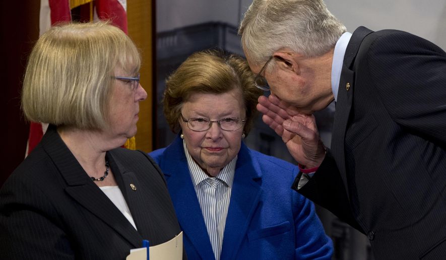 Senate Minority Leader Harry Reid of Nev., right, leans in to speak to Sen. Barbara Mikulski, D-Md., center, as Sen. Patty Murray, D-Wash., stands left, during a news conference on Capitol Hill in Washington, Wednesday, April 27, 2016, to call on congressional Republicans to approve President Barack Obama&#x27;s emergency supplemental request to fight the Zika virus. (AP Photo/Carolyn Kaster)