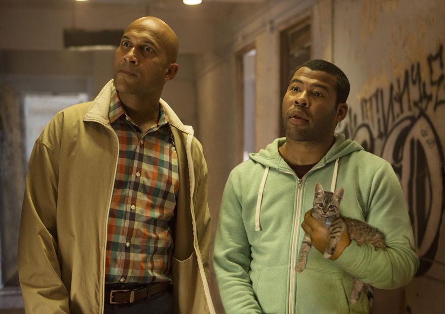 This image released by Warner Bros. Entertainment shows Keegan-Michael Key, left, and Jordan Peele in a scene from "Keanu." (Steve Dietl/Warner Bros. Entertainment via AP)