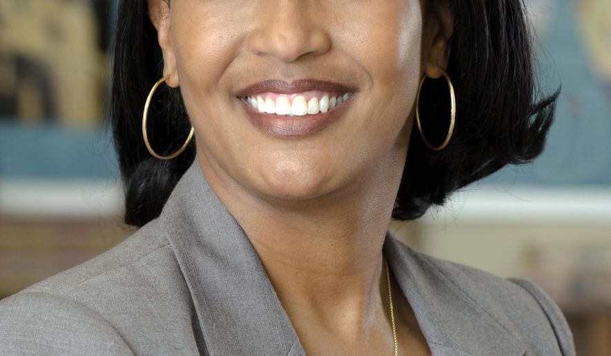 This April 2016 photo released by the Waterbury Public Schools shows Jahana Hayes in Waterbury, Conn., a history teacher at John F. Kennedy High School who was selected as the National Teacher of the Year announced Thursday, April 28, by the Council of Chief State School Officers. She will be recognized by President Barack Obama at a White House ceremony on Tuesday, May 3. (David Therault/Waterbury Public Schools via AP) MANDATORY CREDIT.