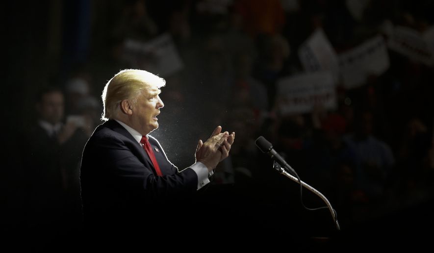 Republican presidential candidate Donald Trump speaks during a rally, Thursday, April 28, 2016 in Costa Mesa, Calif. (AP Photo/Chris Carlson)