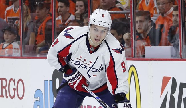 Washington Capitals&#x27; Dmitry Orlov in action during Game 3 in the first round of the NHL Stanley Cup hockey playoffs against the Philadelphia Flyers, Monday, April 18, 2016, in Philadelphia. Washington won 6-1. (AP Photo/Matt Slocum)