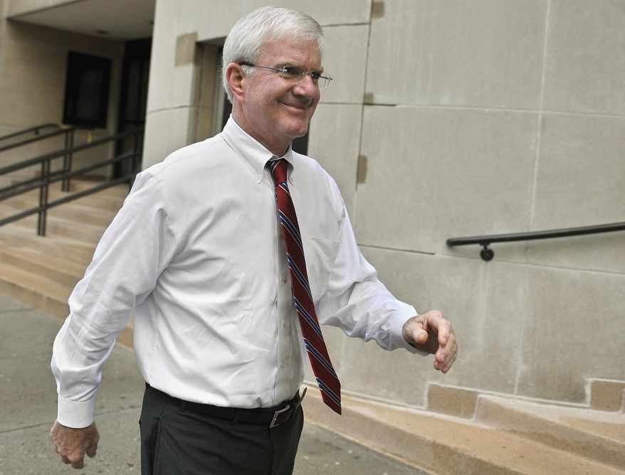FILE - In this Oct. 13, 2011, file photo, prosecutor Michael Dearington walks outside Superior Court in New Haven, Conn., during day two of jury deliberations in the trial of Joshua Komisarjevsky. Dearington, New Haven State's Attorney who won murder convictions against Komisarjevsky and his cohort Steven Hayes in the Cheshire home invasion case, recently informed state officials that he will retire effective June 1, 2016. (AP Photo/Jessica Hill, File)
