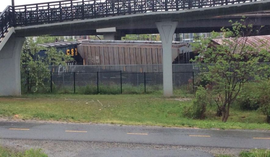 Several cars remain overturned after a CSX freight train derailed in Washington on Sunday, May 1, 2016. (DC Fire and EMS via AP)