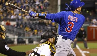 Chicago Cubs&#39; David Ross (3) drives in two runs with a hit against the Pittsburgh Pirates in the fifth inning of a baseball game, Monday, May 2, 2016, in Pittsburgh. (AP Photo/Keith Srakocic)