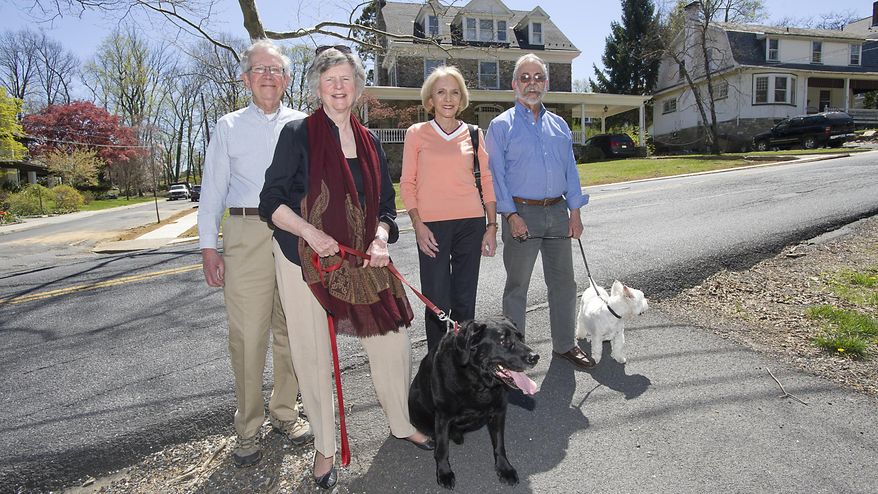 College Hill co-founders, from left, David Hogenboom, Mary Liz Colley, Mary Ann Dwyer and Danny Cohen are photographed outside Nevin Park in Easton, Pa., on Monday, April 18, 2016. The Village on College Hill is a volunteer-driven, grass-roots organization mostly of seniors helping other seniors. The organization envisions a network in which volunteers offer a ride to the store, house work, assistance with technology, or social and emotional support. (Harry Fisher/The Morning Call via AP) THE EXPRESS-TIMES OUT; WFMZ OUT; MANDATORY CREDIT