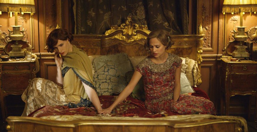 FILE - This file photo provided by Focus Features shows, Eddie Redmayne, left, as Lili Elbe, and Alicia Vikander as Gerda Wegener, in Tom Hooper’s "The Danish Girl." Hollywood films remained static in their inclusiveness of LGBT characters in 2015, but the racial diversity of those characters fell dramatically, according to the findings of GLAAD's annual study released on Monday, May 2, 2016. The studios' art house divisions, like Focus Features and Fox Searchlight, fared better overall with releases like "The Danish Girl," ''Grandma" and "Chi-Raq." (Agatha A. Nitecka/Focus Features via AP, File)