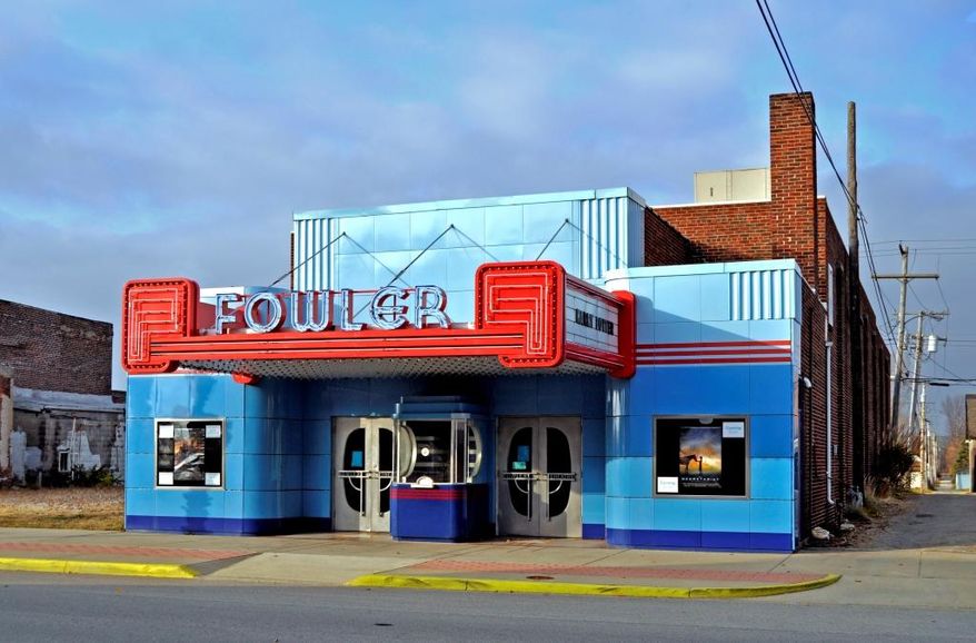 This undated photograph provided by Lee Lewellen shows the Fowler Theatre, a movie theater in northwest Indiana once slated for demolition that has been restored to its Art Deco glory. The nonprofit that restored the 1940 building, the Prairie Preservation Guild, recently won Indiana Landmarks' annual Cook Cup for Outstanding Restoration. The group formed in 2000 after the theater's owner announced that it would be stripped of its Art Deco elements and demolished. That prompted the guild to purchase the theater in the town about 25 miles northwest of Lafayette and spend 14 years restoring it. (Lee Lewellen via AP) MANDATORY CREDIT