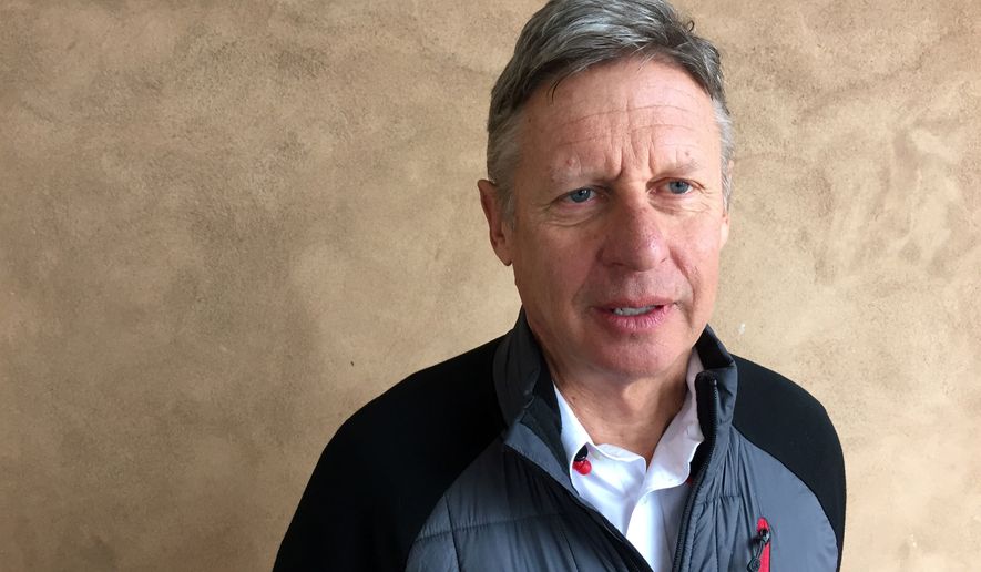 Gary Johnson, a one-time Republican who&#x27;s running for the Libertarian Party nomination, urged disaffected Republicans and conservatives to support his presidential bid. (Associated Press)