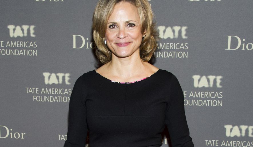 FILE - In this May 8, 2013 file photo, Amy Sedaris attends the Tate Americas Foundation Artists Dinner in New York. Sedaris will be hosting a giveaway of artwork that once hung in Super 8 motel rooms. The art will be given away Wednesday evening at a Manhattan gallery, Openhouse. The brand is redecorating all of its rooms as it undergoes a transformation. (Photo by Charles Sykes/Invision/AP, File)