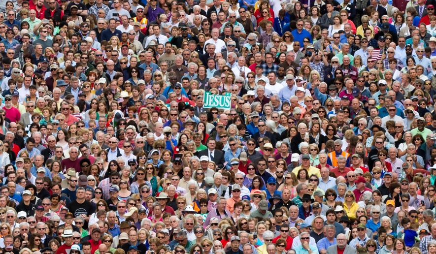 Thousands gather for a prayer rally with evangelist Franklin Graham on the plaza across the street from the state Capitol in Nashville, Tenn., on Tuesday, May 3, 2016. (AP Photo/Erik Schelzig)