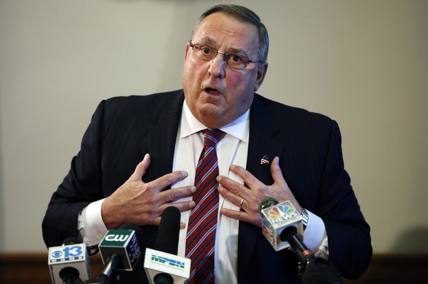 FILE - In this Jan. 8, 2016 file photo, Maine Gov. Paul LePage speaks at a news conference at the State House, in Augusta, Maine. A federal judge on Tuesday, May 3, 2016, dismissed a lawsuit accusing LePage of using blackmail to force a charter school operator to rescind a job offer to a political opponent in a flap that roiled the Legislature and led to an impeachment effort. (AP Photo/Robert F. Bukaty, File)