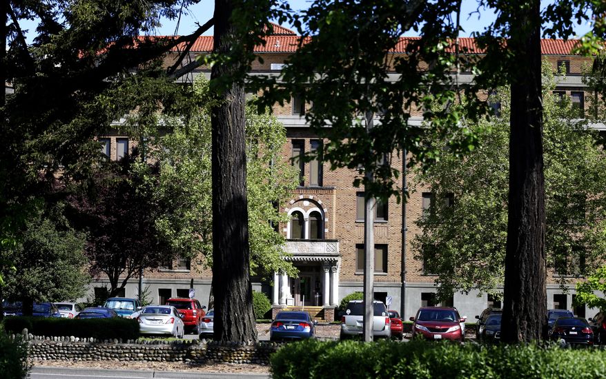 This May 2, 2016 photo, shows the Western State Hospital in Lakewood, Wash. When two dangerous patients escaped from the facility on April 6, 2016, officials called it a rare occurrence, but a review of police reports and interviews with staff by The Associated Press reveals numerous cases in which patients escaped or walked away in just the past 3 1/2 years or so. (AP Photo/Ted S. Warren)