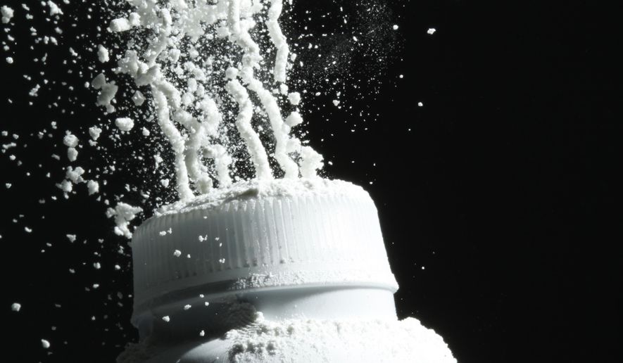 FILE - In this April 19, 2010, file photo, Johnson's baby powder is squeezed from its container, in Philadelphia. A St. Louis jury has ordered Johnson & Johnson to pay a second huge award over claims that its talcum powder causes cancer. The company was ordered Monday, May 2, 2016, to pay a multi- million dollar settlement to a South Dakota woman who blamed her ovarian cancer on years of baby powder use. (AP Photo/Matt Rourke, File)