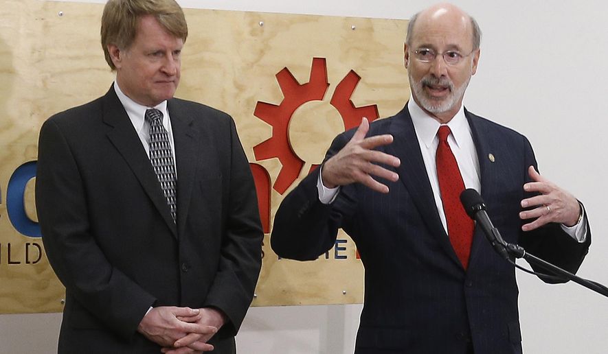 FILE - In this April 8, 2015 file photo, Pennsylvania Gov. Tom Wolf, right, and Allegheny County Executive Rich Fitzgerald speak to reporters during a stop as part of the governor's "Jobs That Pay" tour at TechShop in Pittsburgh. Wolf, Fitzgerald and Pittsburgh Mayor Bill Peduto say Tuesday, May 3, 2016, they've sent a letter asking the state Public Utility Commission to greatly reduce last month's $11.4 million fine against ride-sharing company Uber, the largest in the commission's history, which they say would stifle innovation and technology companies. (AP Photo/Keith Srakocic, File)