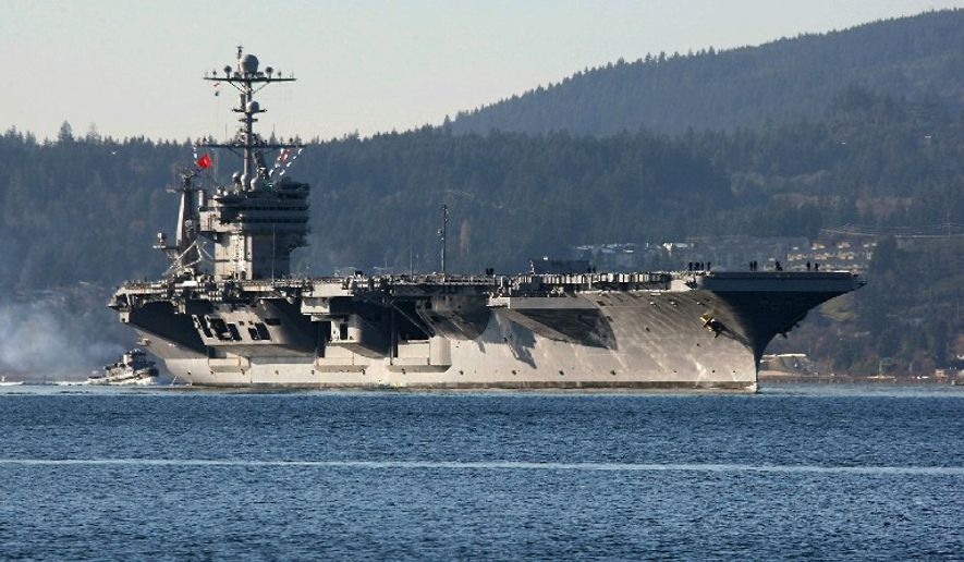 The aircraft carrier USS John Stennis was refused a port call in Hong Kong, in an apparent sign of mounting tension with China in the South China Sea. As a result, the Pentagon may be moving its visits to Taiwan. (Associated Press/File)
