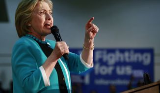 Democratic presidential candidate Hillary Clinton campaigns at East Los Angeles College in Los Angeles, Thursday, May 5, 2016. (AP Photo/Damian Dovarganes)